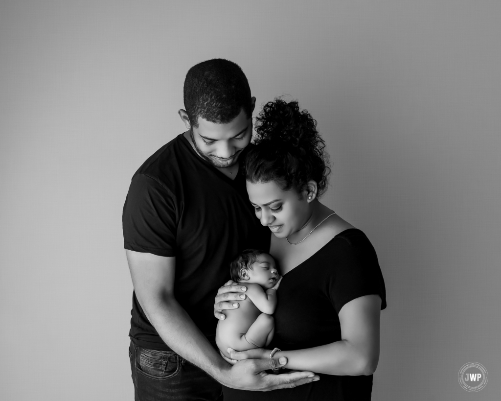 newborn girl mother father dark skin Kingston baby photographer