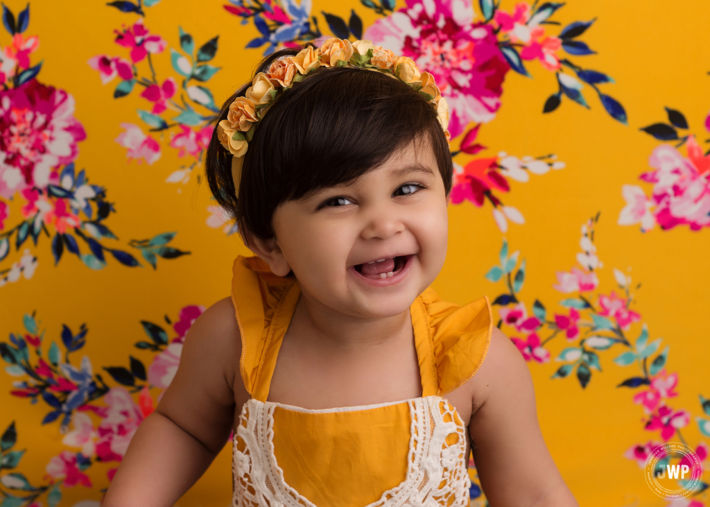yellow romper floral crown yellow backdrop Kingston first birthday photographer