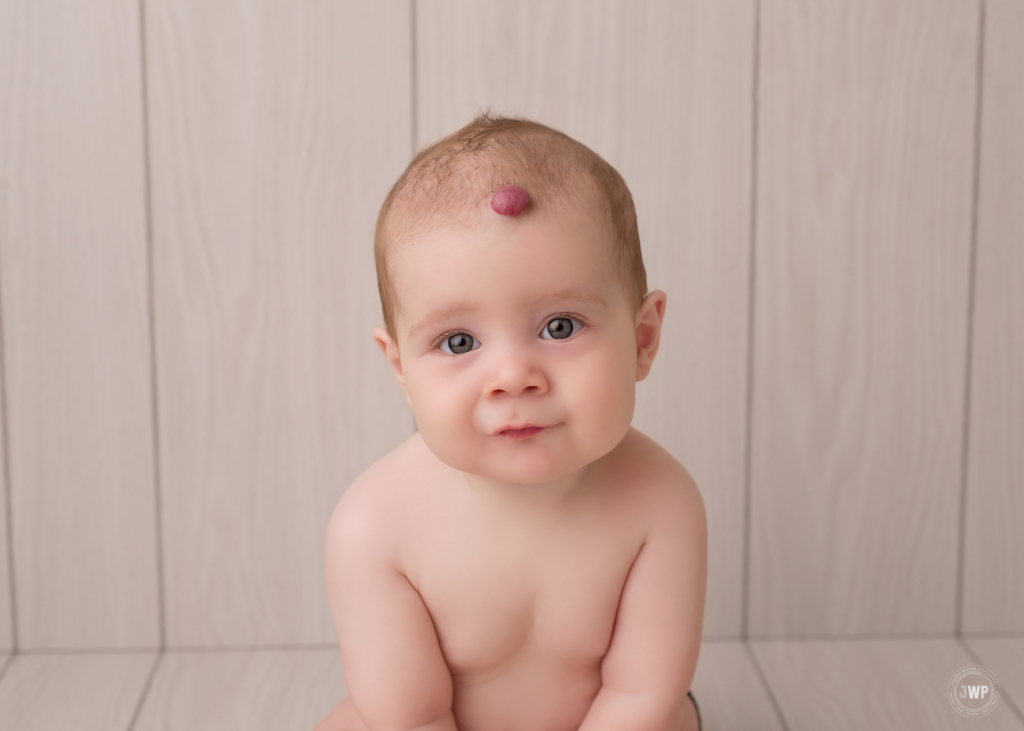 6 month old baby milestone white wood backdrop Belleville portrait photographer