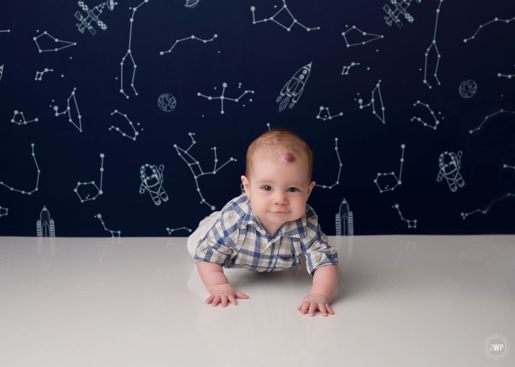6 month old sitter session blue space backdrop Kingston baby milestone photographer
