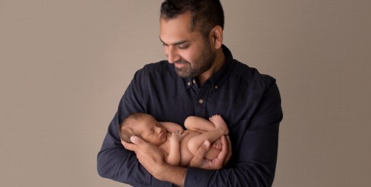 baby boy fathers arms Kingston newborn photographer