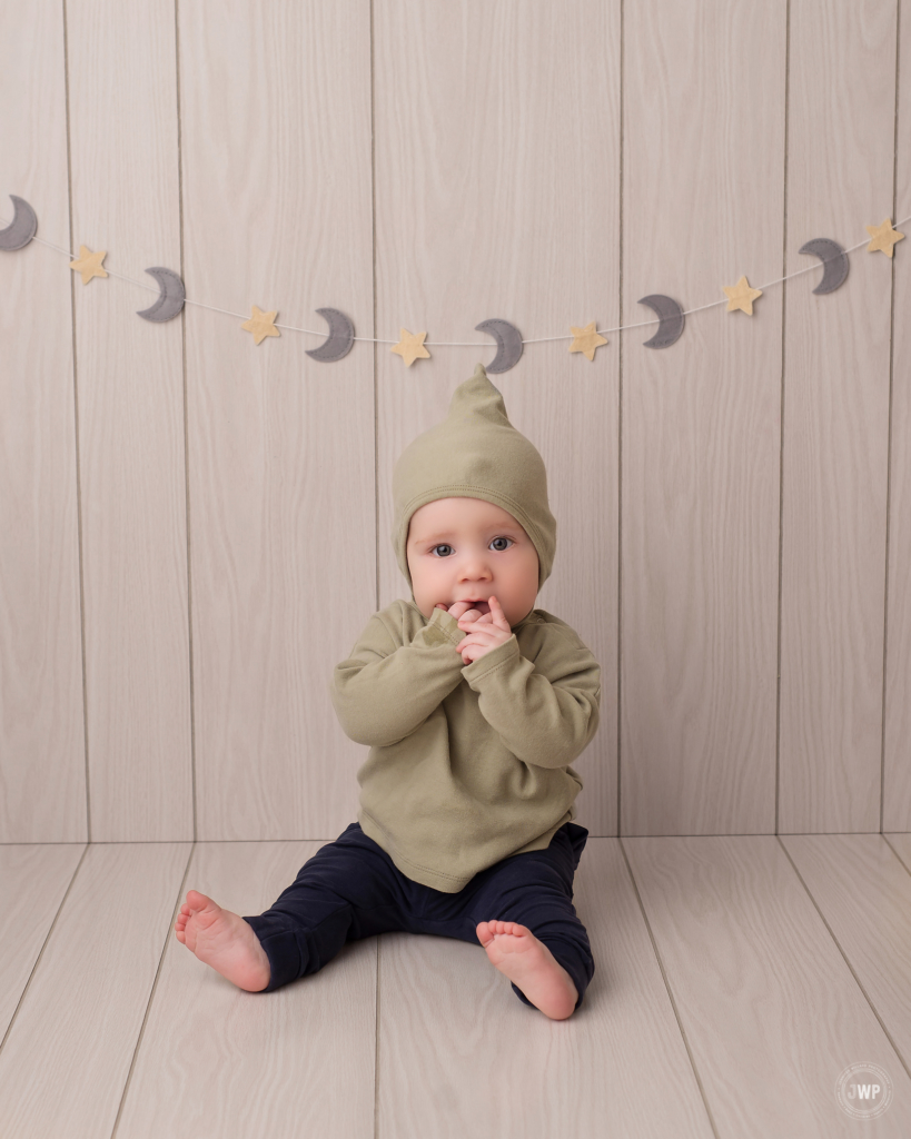 baby boy stars and moon garland white wood backdrop 6 month old Kingston photographer