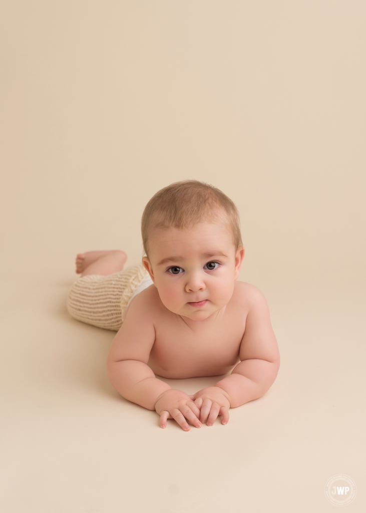 6 month old baby boy cream backdrop Kingston milestone photography