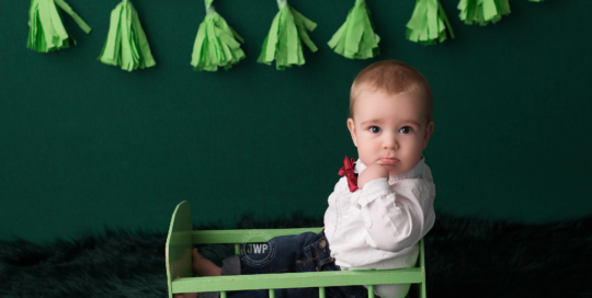 baby boy green backdrop and cradle by Kingston milestone photographer