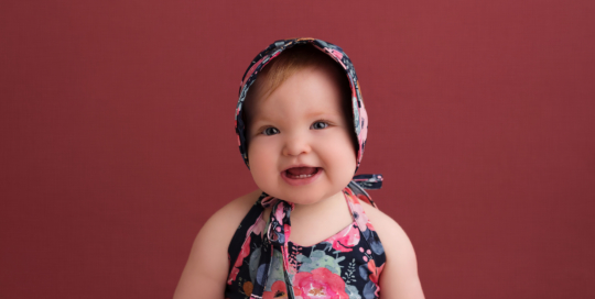 first birthday baby portrait girl flower romper bonnet Kingston baby photographer