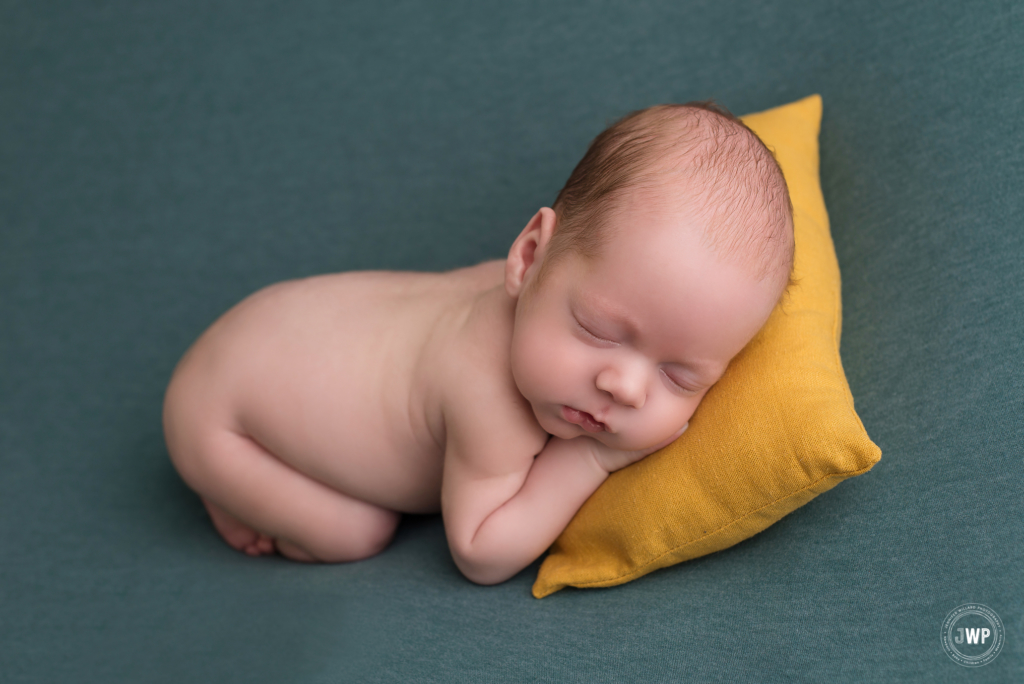 baby boy blue blanket yellow pillow Kingston newborn photographer