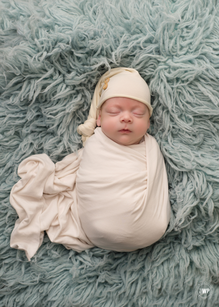 baby boy cream wrap sleepy hat blue flokati Kingston newborn photographer