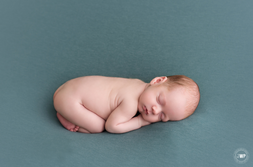 baby boy lying on belly Kingston newborn photographer