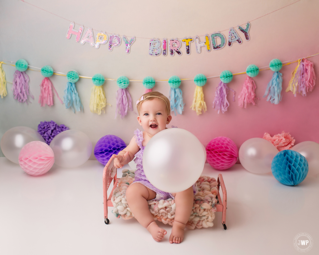 baby rainbow cake smash balloons Kingston first birthday photographer
