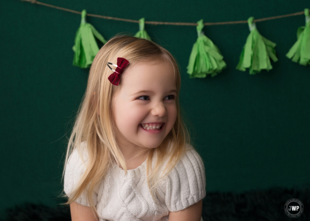 girl emerald backdrop green tassel banner Kingston children photographer