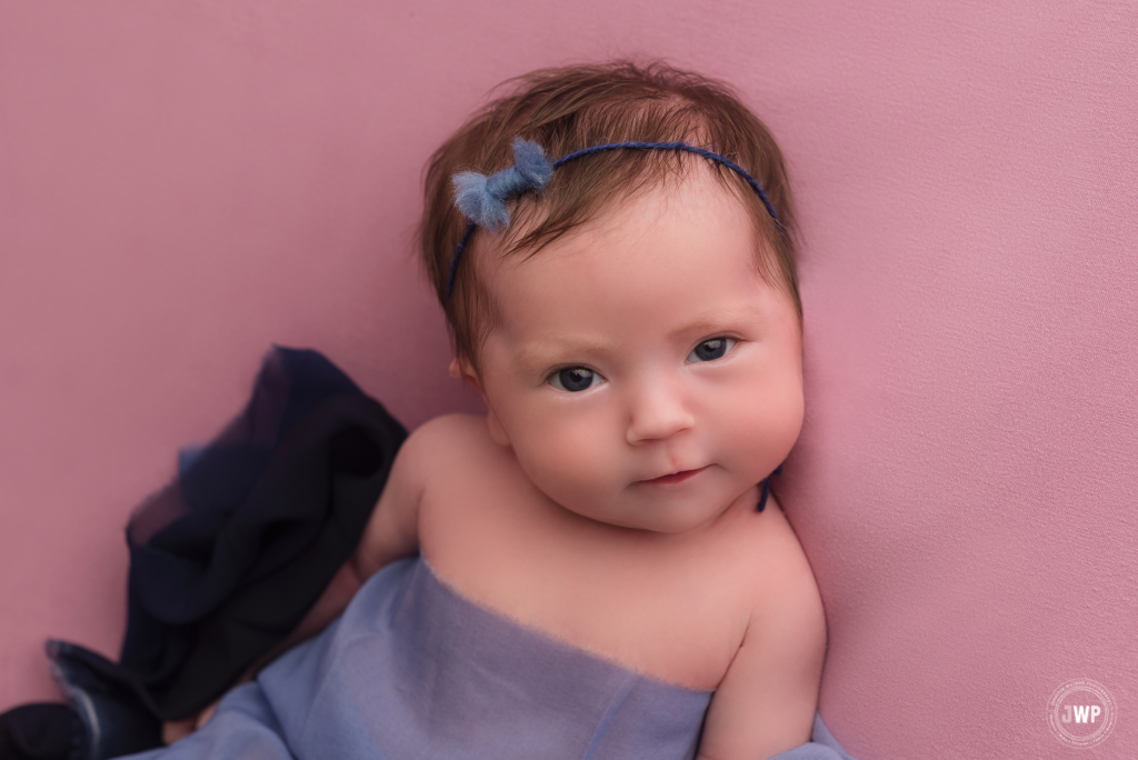 baby girl eyes open blue wrap headband Kingston newborn photographer