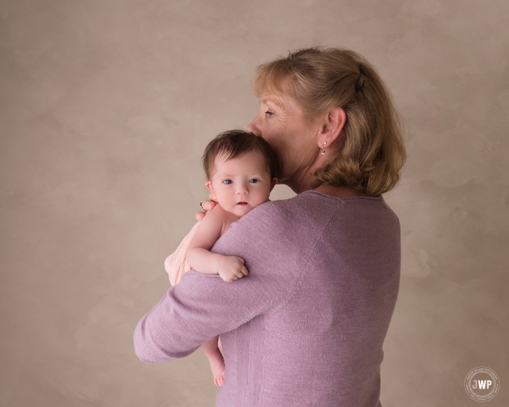 newborn girl grandmother pink wrap purple sweater Kingston Studio Photographer