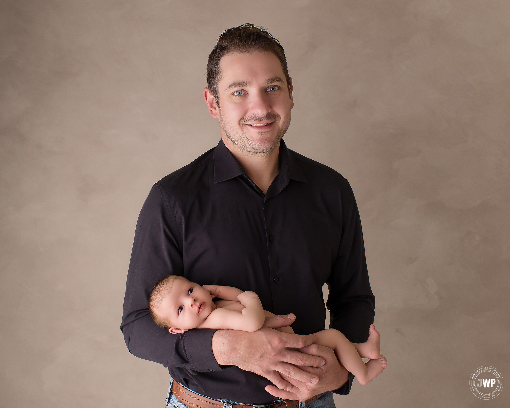 Father baby girl wide awake in arms portrait studio Kingston newborn photographer