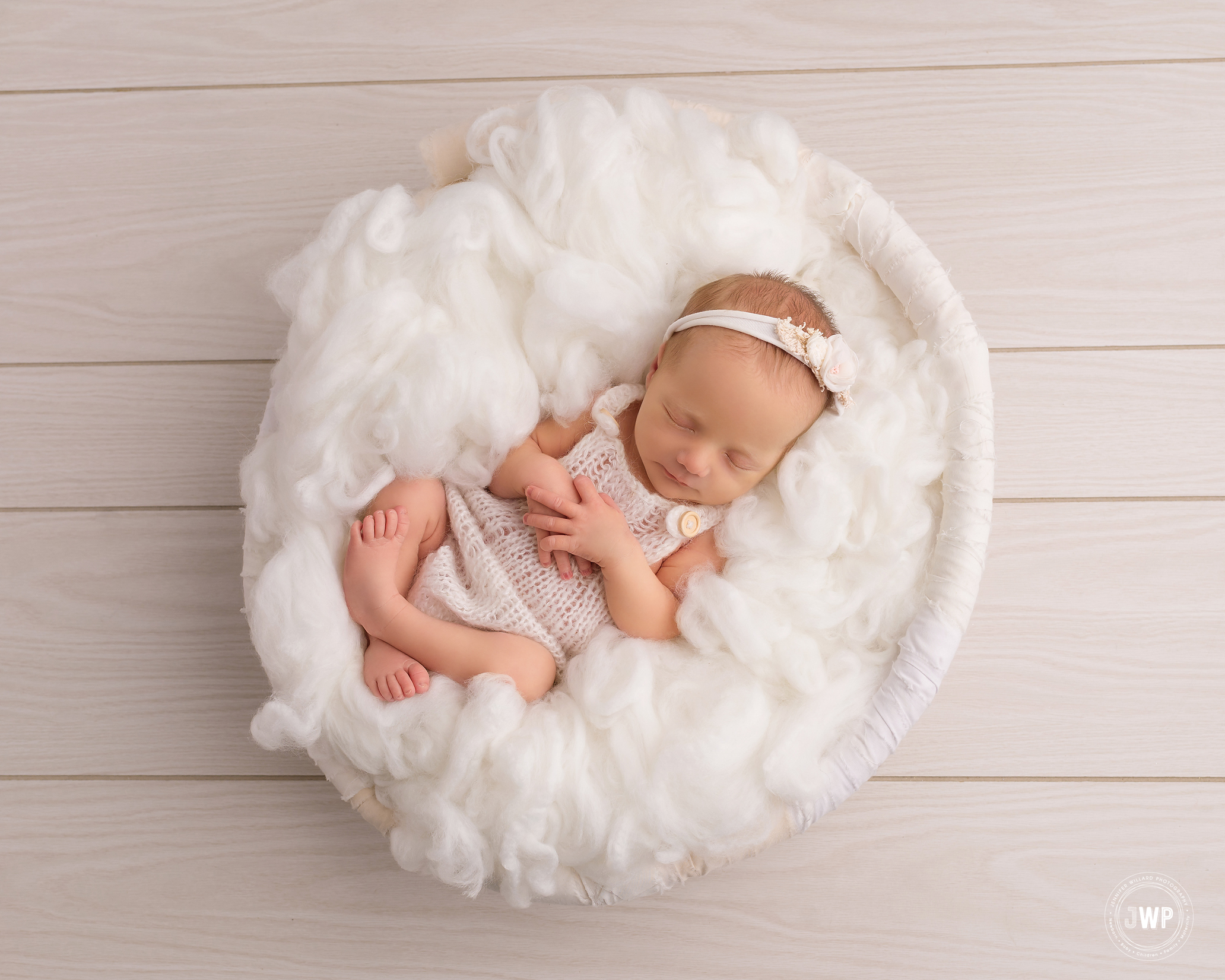 newborn girl white wool fluff wood backdrop Kingston baby photographer