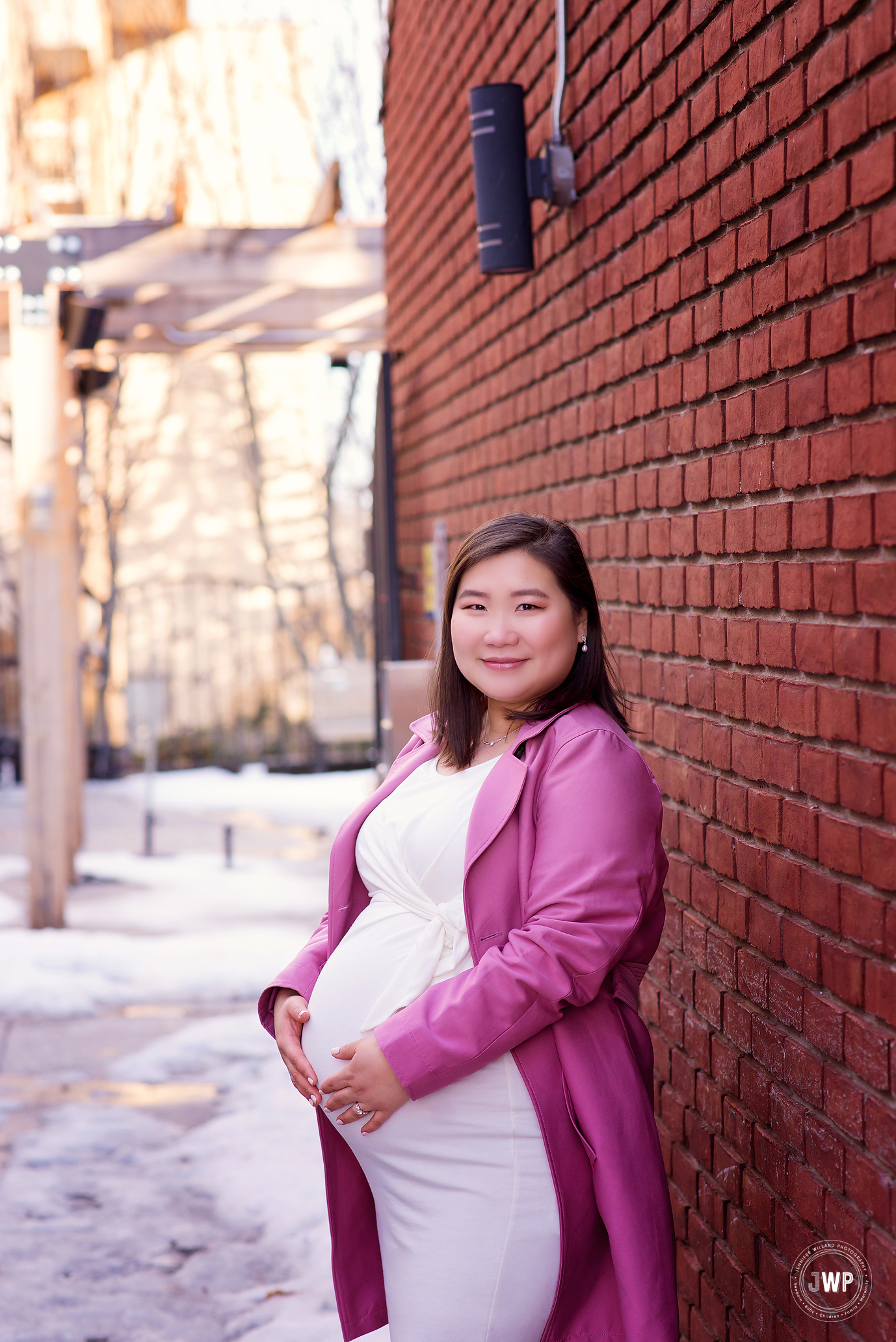 pregnant mother pink coat cream dress red brick alley Kingston maternity photographer