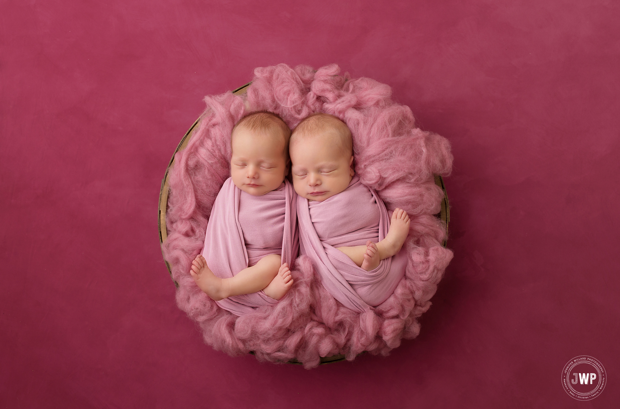 twin girls pink wool fluff basket texture backdrop Kingston newborn photographer