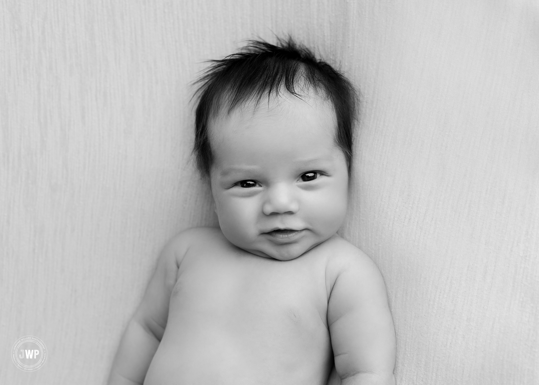 baby boy black and white smiling Kingston newborn photographer