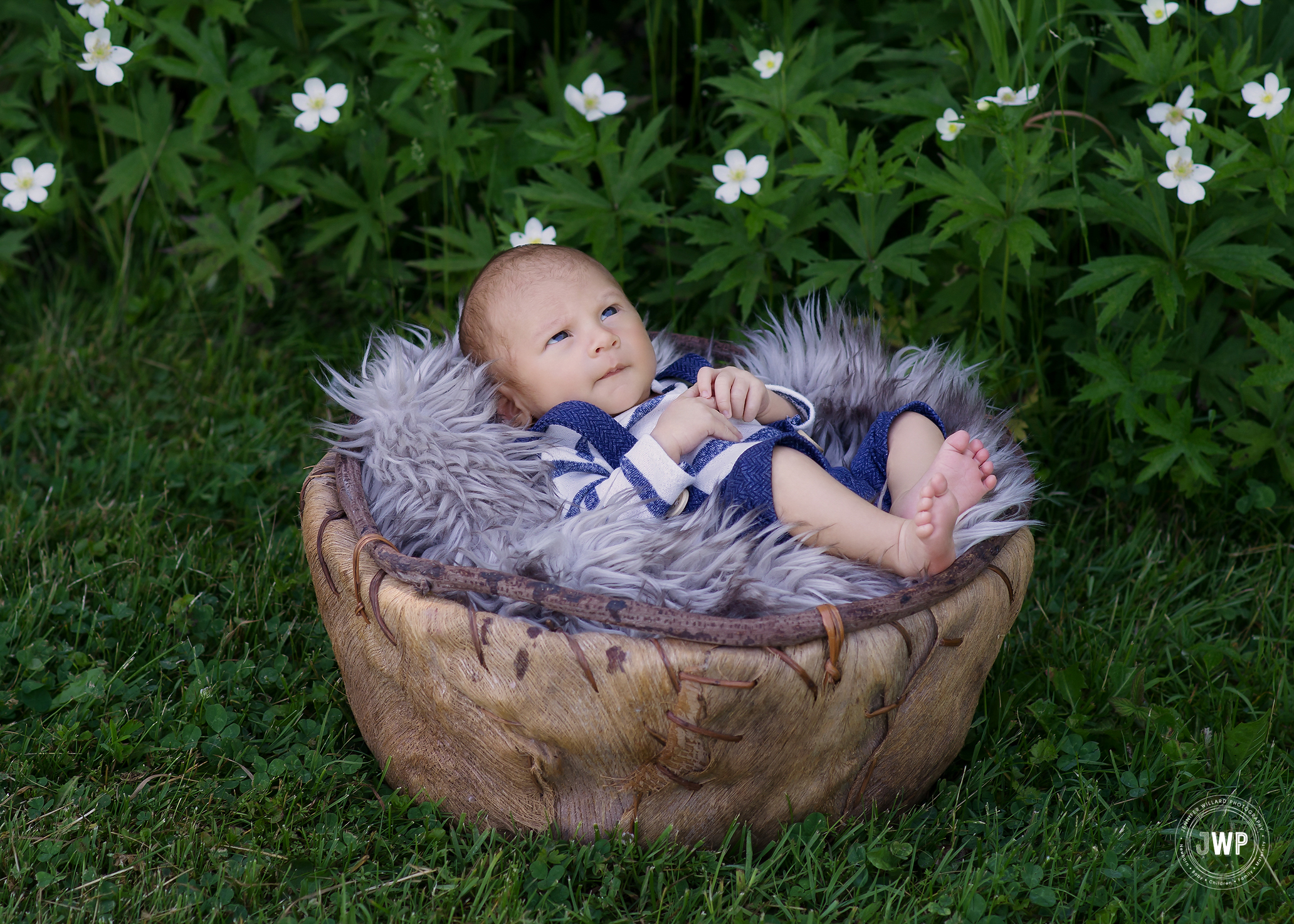 newborn boy outdoor lifestyle unposed burlap basket fur Kingston Photographer