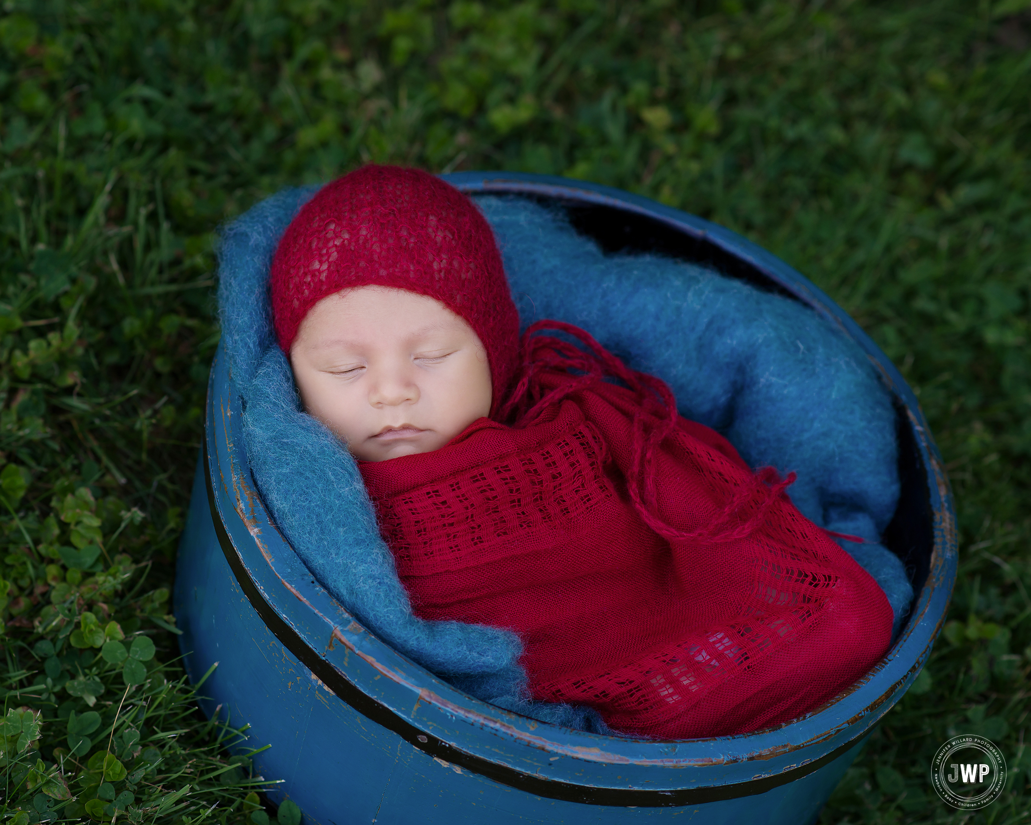 newborn boy red wrap bonnet teal bucket outdoor Kingston lifestyle photographer