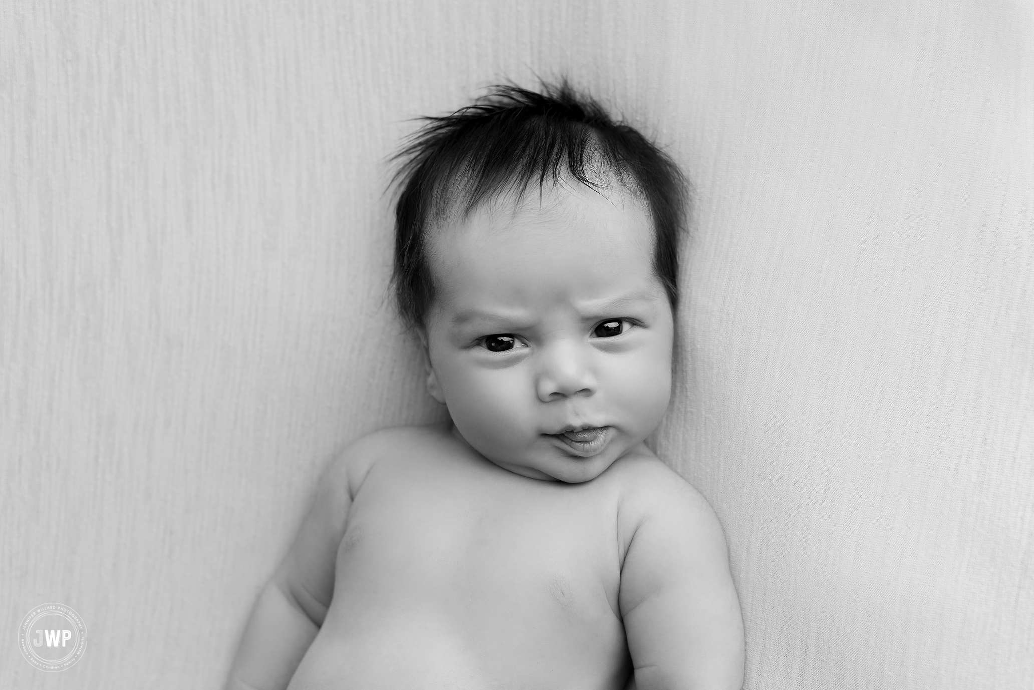 newborn boy black and white silly face Kingston Baby Photographer