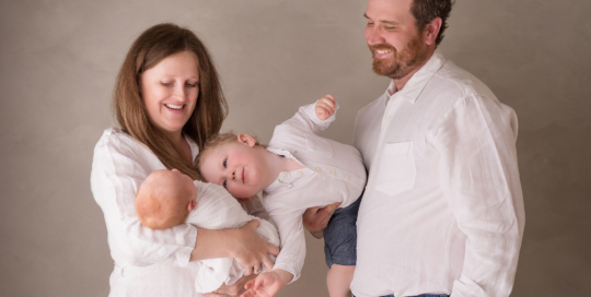 newborn girl brother parents laughing Kingston baby Photographer