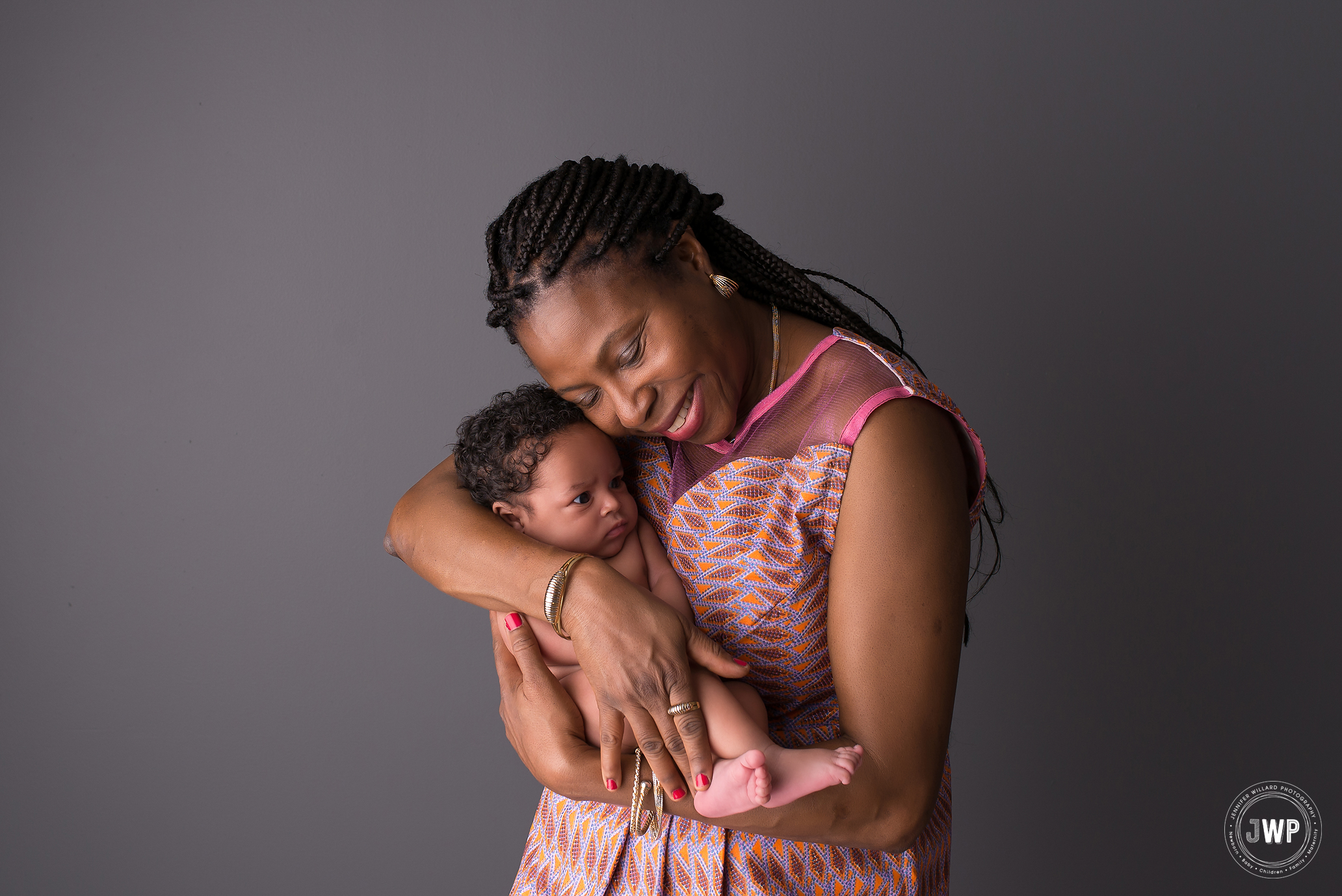 African American Mother newborn boy grey backdrop Kingston baby photographer
