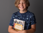 boy star wars book grey backdrop Kingston children photographer