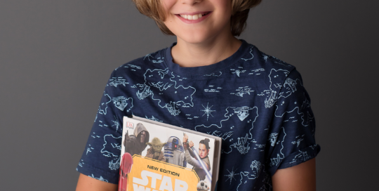 boy star wars book grey backdrop Kingston children photographer