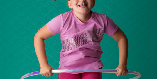 girl jumping hula hoop green purple Kingston children photographer