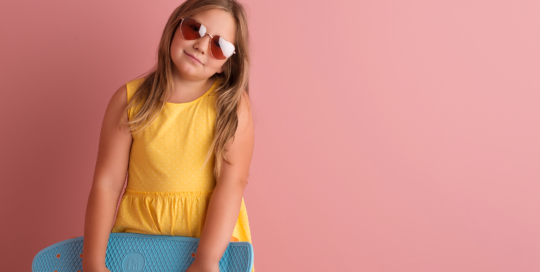 girl skateboard sunglasses pink studio backdrop Kingston portrait artist