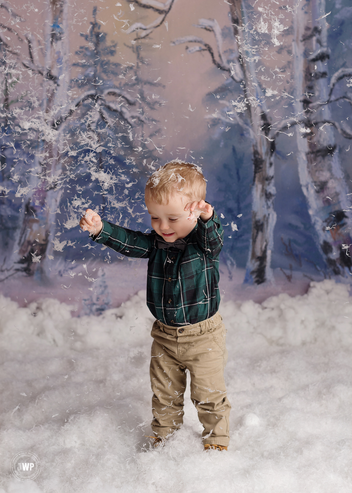 Winter snow scene little boy snowballs Kingston children photography