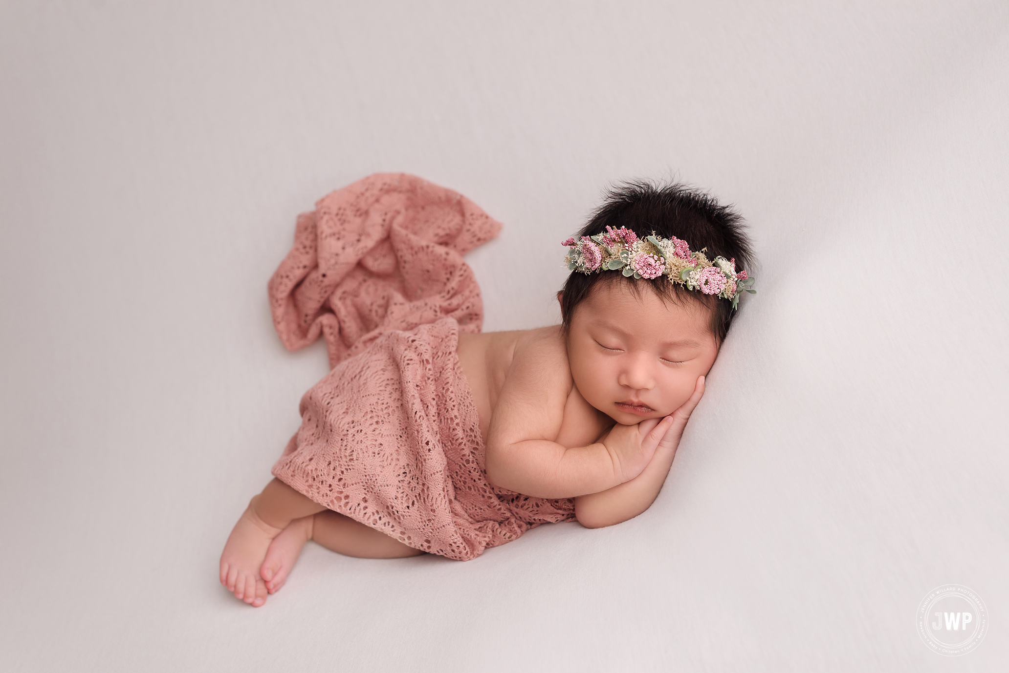 baby girl white blanket pink wrap flower headboard Kingston newborn photographer