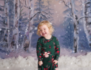 little girl laughing falling snow Winter scene Kingston mini session photography