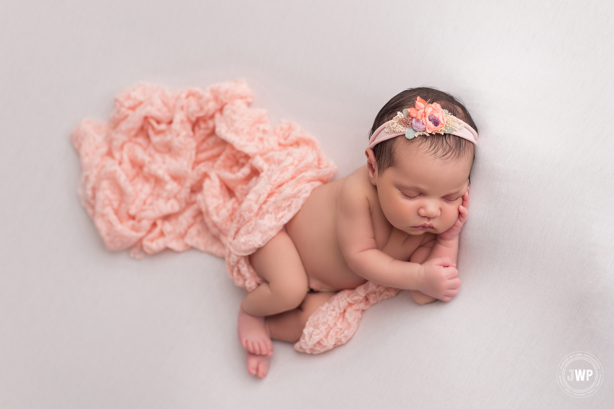 Belleville newborn portrait white blanket peach wrap flower headband