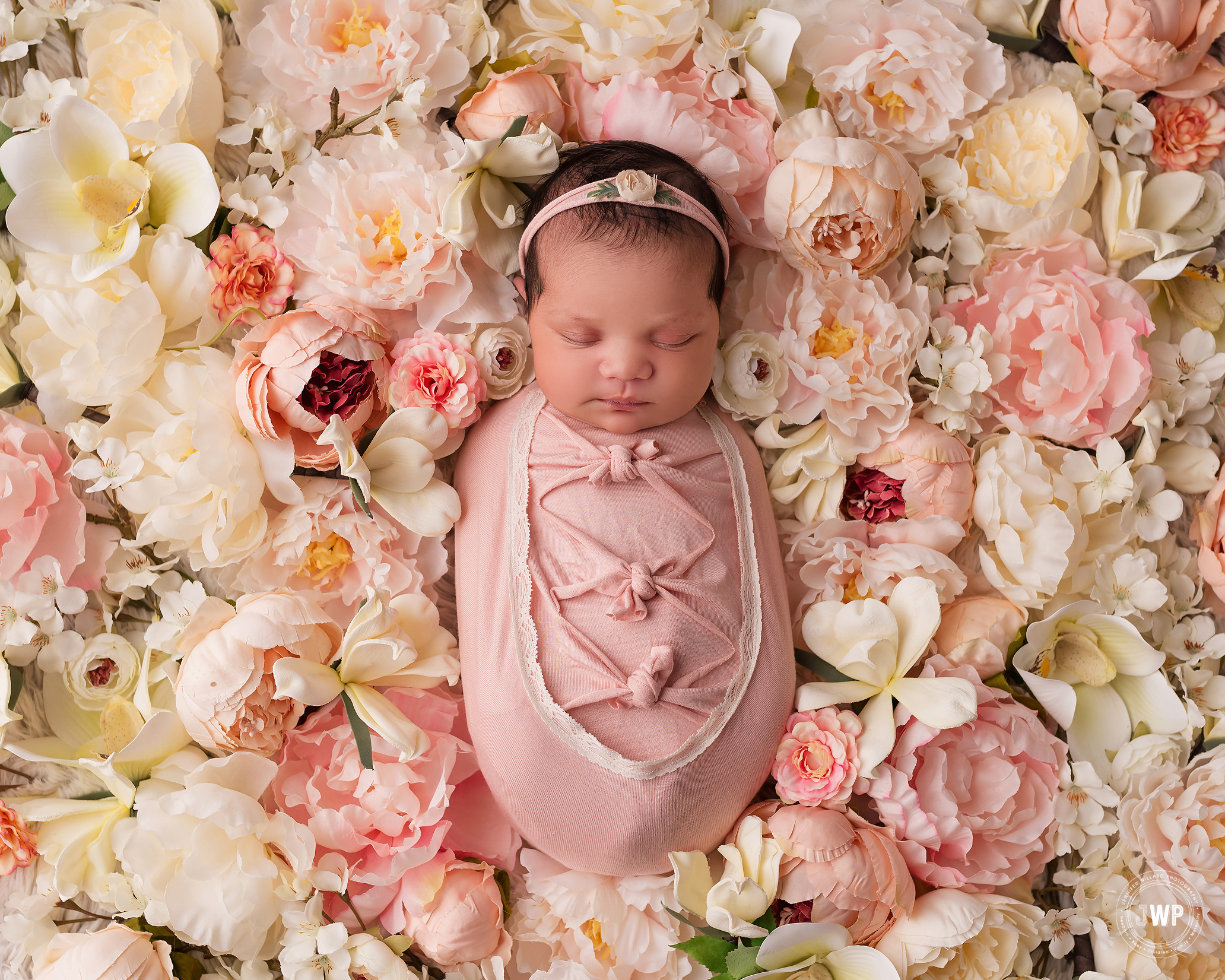 newborn girl flower bed Kingston baby photographer