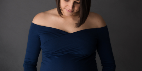 Pregnant Mother Blue Dress Grey backdrop Kingston Maternity Photographer