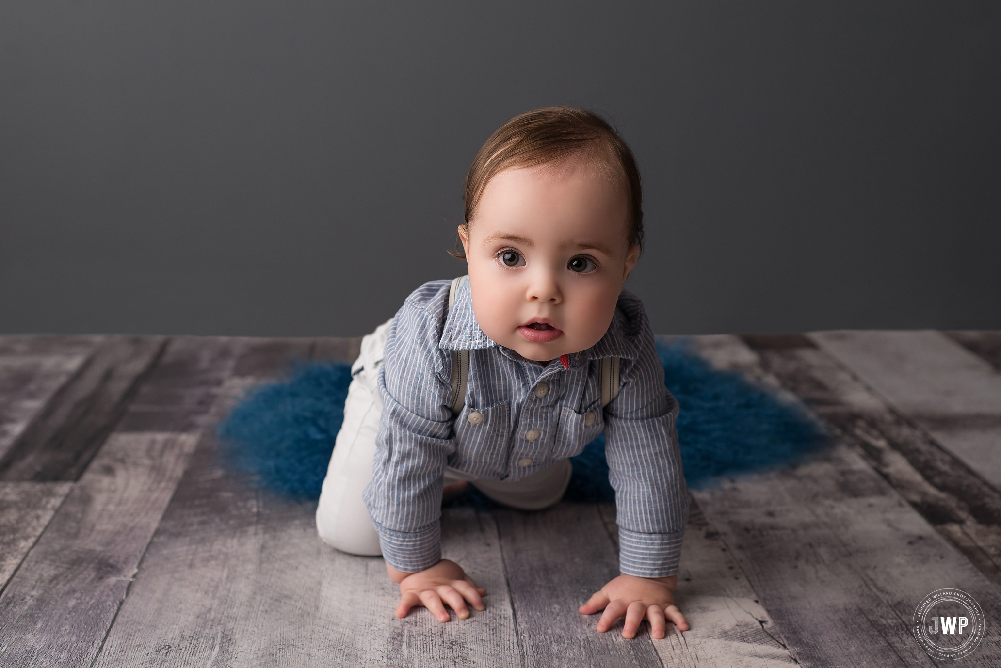 baby crawling grey wood floor Kingston Ontario children photographer