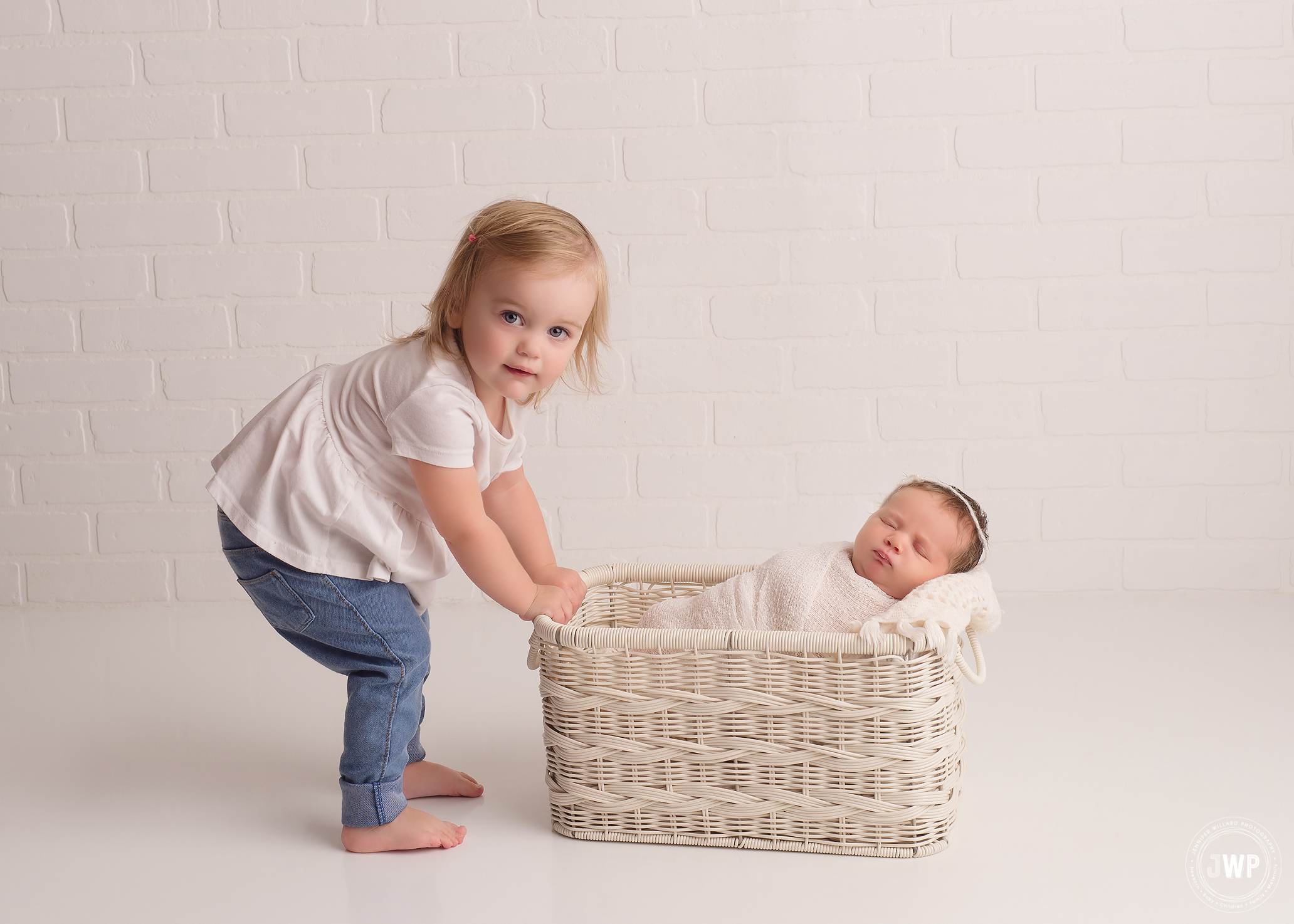 baby girl big sister white basket studio Kingston newborn photographer