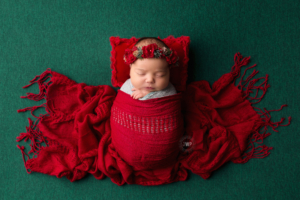newborn girl red wrap green blanket Christmas Kingston baby photographer