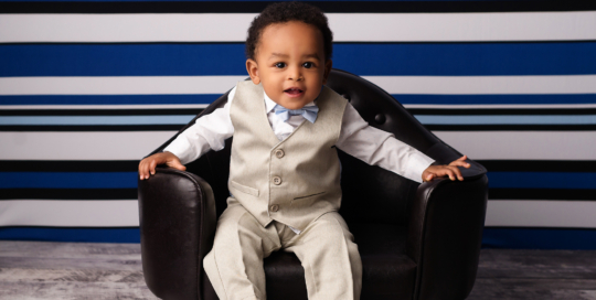 baby boy African American suit black couch striped backdrop Kingston children photographer