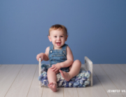 baby boy blue backdrop bed overalls Kingston baby photographer