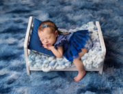 baby girl blue dress romper bed fur Kingston newborn photographer