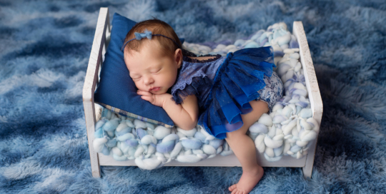 baby girl blue dress romper bed fur Kingston newborn photographer