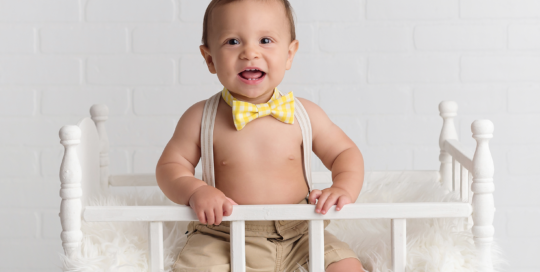 first birthday baby boy yellow bowtie crib Kingston birthday photographer