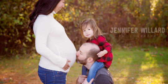 pregnant mother Father kissing belly daughter Kingston family maternity photographer